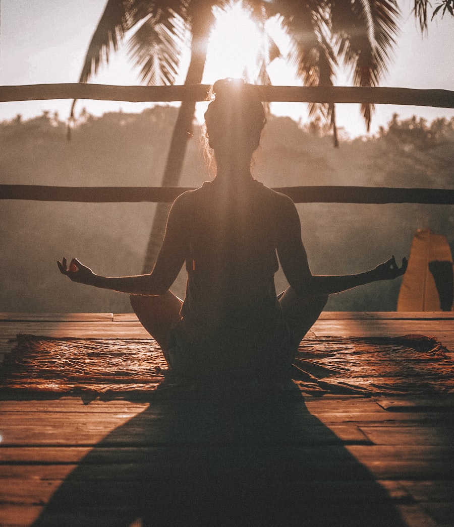 Person stretching outdoors during a calm body awareness session for Plantsieve